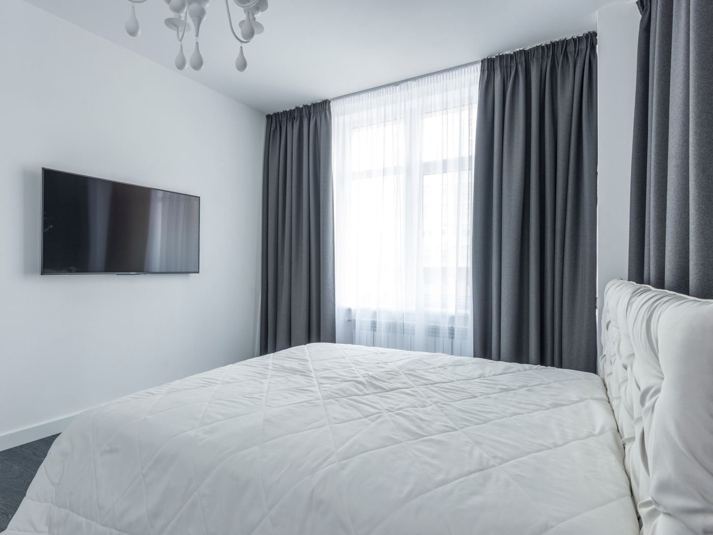Clean curtains in a Singapore bedroom by Cleanitize