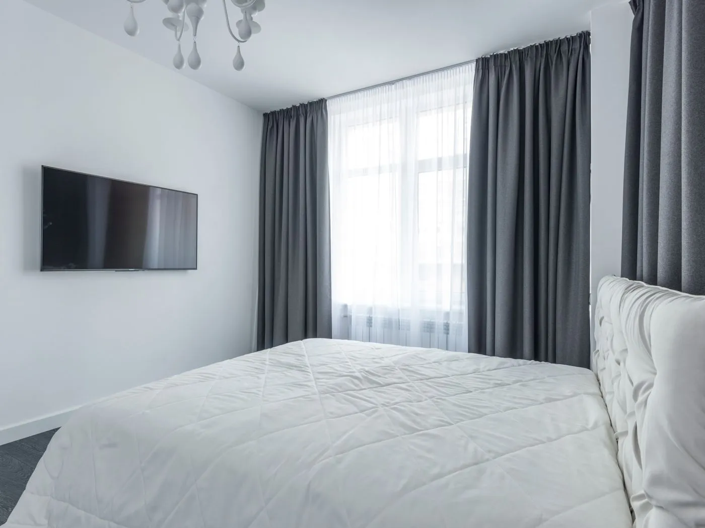 Clean curtains in a Singapore bedroom by Cleanitize
