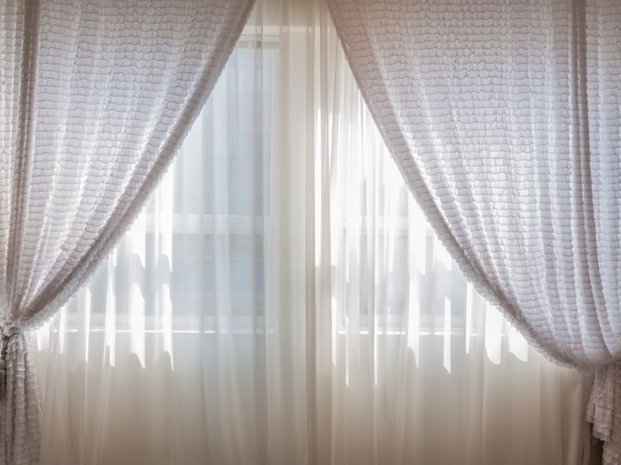 Sheer curtains in sunlight — freshened by Cleanitize curtain cleaning Singapore