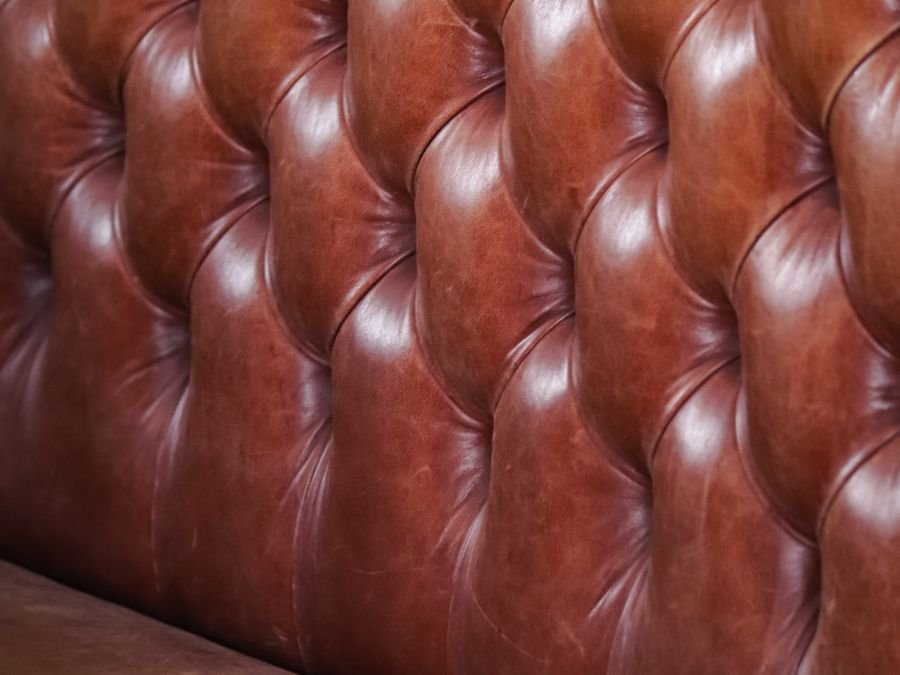 Brown leather upholstery close-up — cleaned and conditioned by Cleanitize Singapore