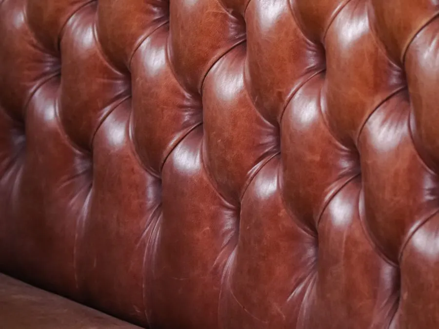 Brown leather upholstery close-up — cleaned and conditioned by Cleanitize Singapore
