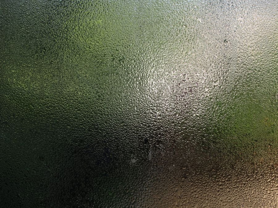 Condensation on glass — damp and musty odours tackled by Cleanitize Singapore