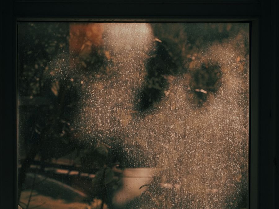 Hazy dust film on a window pane — restored clear by Cleanitize Singapore