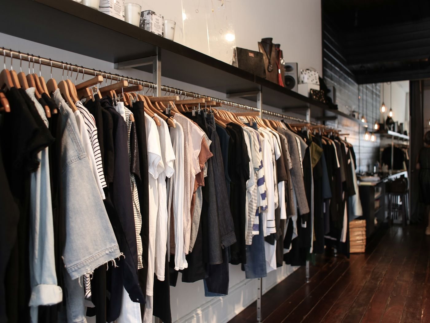 Clean garments on a rack, dry cleaning service in Singapore by Cleanitize